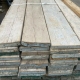 This is a picture of reclaimed scaffold boards. A reclaimed board is one which comes from stock used in actual scaffolding. Great for extra character and therefore tend to be what people are looking for when they're after that classic, rustic look. Newer boards are more uniform, clean, and therefore more sought after by makers, as they are suited to furniture and other similar uses.