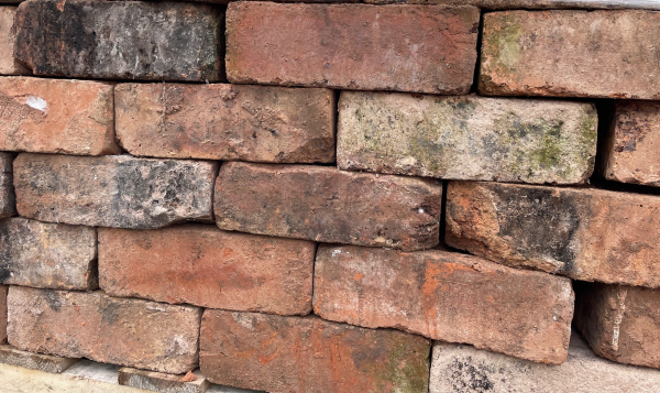 Leek common bricks, Reclaimed mixed blend colour Dimension: 230mm x 110mm x 75mm THE BENEFITS OF USING RECLAIMED LEEK COMMON BRICKS FOR YOUR PROJECT When embarking on a construction project, one of the foremost basic decisions to be made is what building materials to use. With the current increased awareness of sustainability, many individuals are turning to reclaimed materials in their projects. Such materials are ones that have been used previously in a different building project but are suitable for re-purposing. There is a lot of choice available when it comes to reclaimed materials and in this article, we will be looking at some of the benefits of using reclaimed bricks. Cost Especially in larger scale building, costs can be a major concern for the feasibility of a project. It is, therefore, advantageous to find good deals and cheaper materials – without sacrificing quality – wherever possible. Using reclaimed bricks is an excellent choice for lowering expenditure on your project. These bricks do not have any of the associated production costs attached to them that new materials do, allowing the prices to stay low. Environmentally friendly One of the largest advantages of using reclaimed bricks is that they are an environmentally friendly option. The construction industry in the UK is a huge contributor to national waste and carbon emissions. Such emissions can come from extracting, producing, manufacturing and transporting building materials. However, by using reclaimed bricks you can cut out a lot of this negative environmental impact as you are using pre-made materials. Adds character Using reclaimed materials for your project can be a fantastic way to add character and individuality. These materials can help create a unique finish, allowing you to make a truly original building. Whether used for an internal feature wall, extension or paving, the variety of textures and tones available with reclaimed bricks are sure to create an attractive and eye catching finish for those with an appreciation of history.